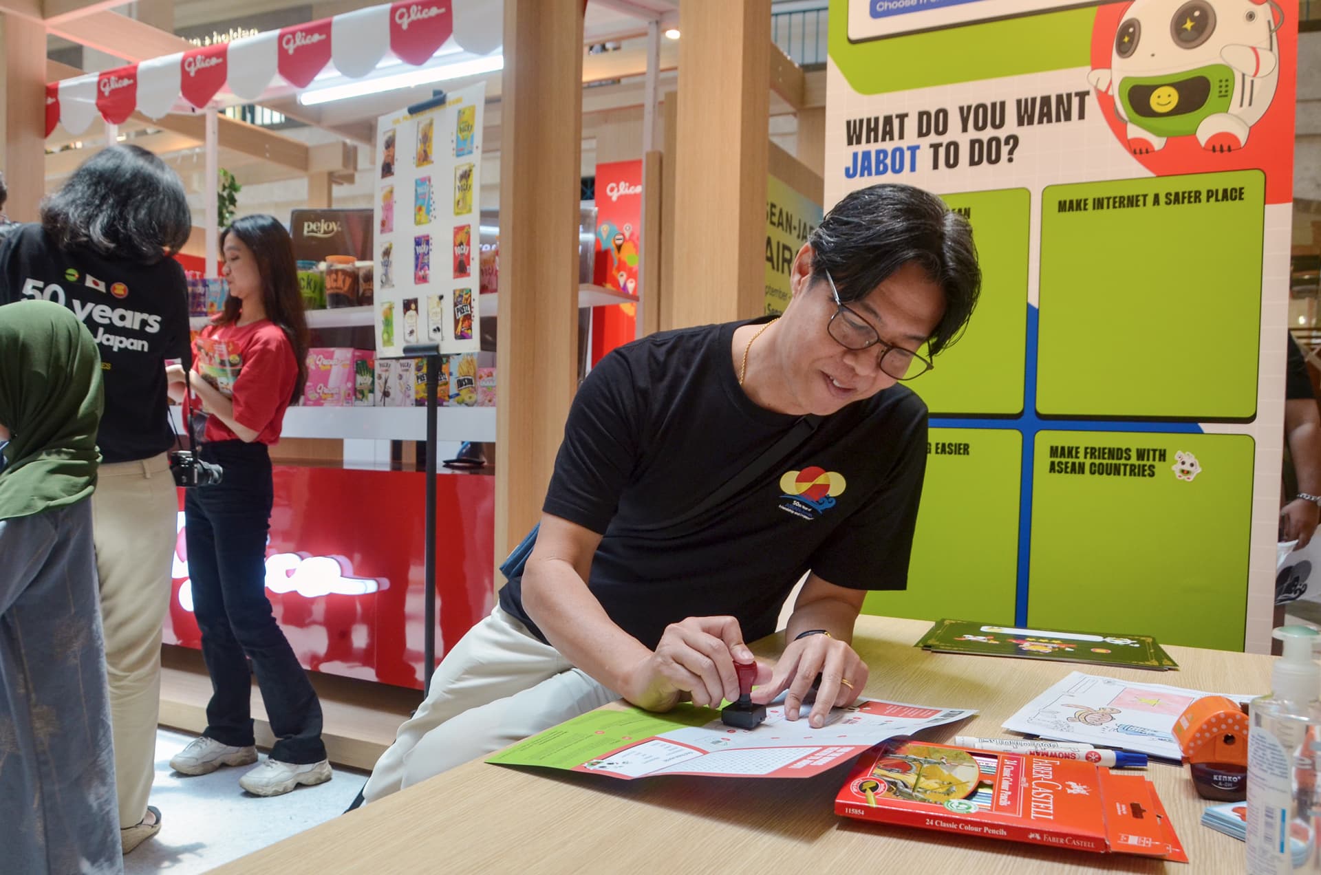 Collecting stamps at the ASEAN Japan Fair